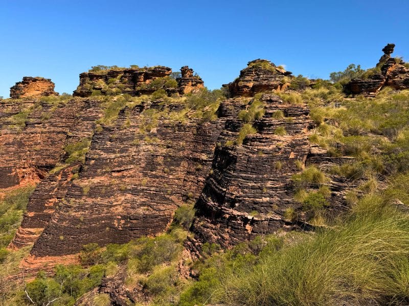 Layered sandstone rock formations at Mirima National Park in Kununurra, Western Australia